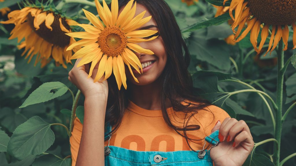 woman holding Sunflower